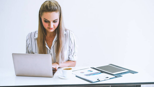 Blonde business woman working at modern office. Business concept.