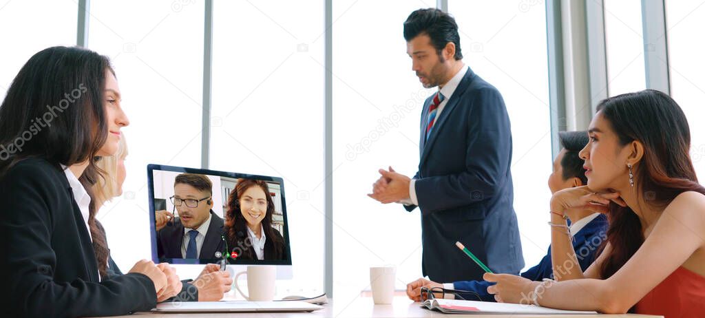 Video call group business people meeting on virtual workplace or remote office. Telework conference call using smart video technology to communicate colleague in professional corporate business.