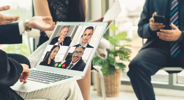 Video call group business people meeting on virtual workplace or remote office. Telework conference call using smart video technology to communicate colleague in professional corporate business.