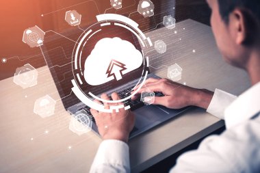 İş ağı konsepti için bulut bilgisayar teknolojisi ve çevrimiçi veri depolama. Bulut veri transferi için internet sunucu servisine bağlanan bilgisayar 3B fütüristik grafik arayüzünde sunuluyor.