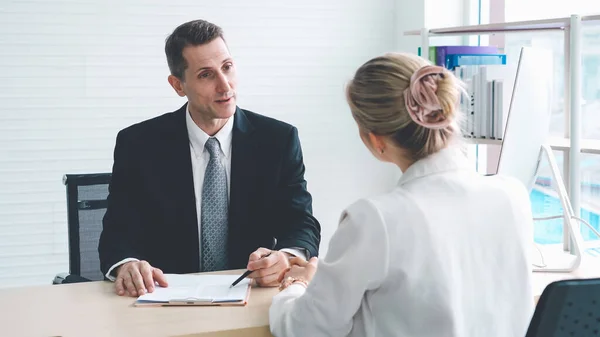 Job seeker in job interview meeting with manager and interviewer at corporate office. The young interviewee seeking for a professional career job opportunity . Human resources and recruitment concept.