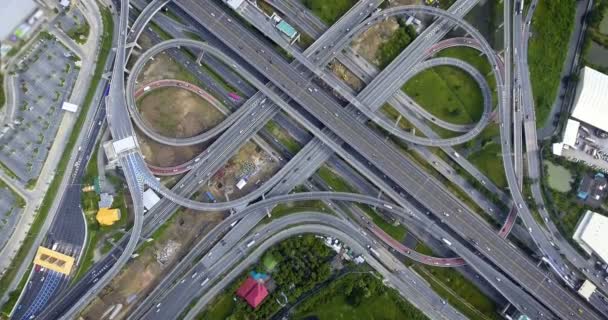 Aerial View of Highway Road Interchange with Busy Urban Traffic Speeding on Road — Stock Video