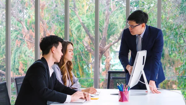 Angry business person dispute work problem in group meeting at office . Business bankrupt failure and loss concept .