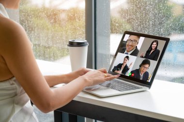 Video call business people meeting on virtual workplace or remote office. Telework conference call using smart video technology to communicate colleague in professional corporate business. clipart