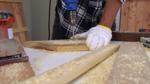 Carpenter working on wood craft at workshop — Stock Video