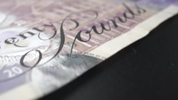 Fifty British Pound paper banknote in close up macro view dolly shot. — Stock Video