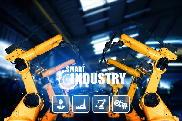 Smart industry robot arms for digital factory production technology showing automation manufacturing process of the Industry 4.0 or 4th industrial revolution and IOT software to control operation .
