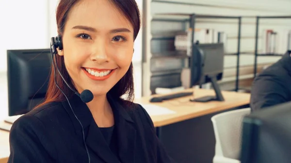 Business people wearing headset working in office — Stock Photo, Image