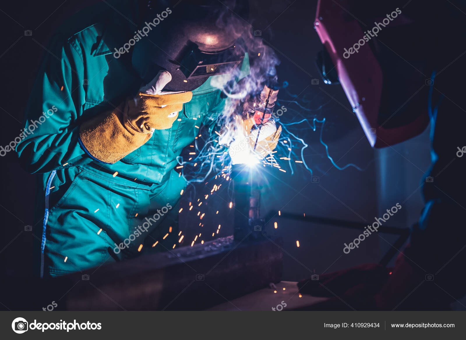 Metal welding steel works using electric arc welding machine Stock