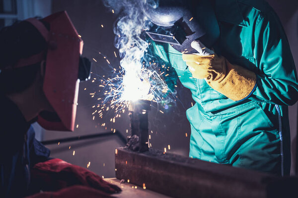 Metal welding steel works using electric arc welding machine