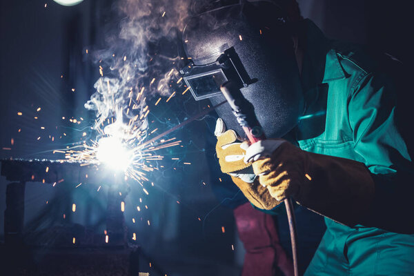 Metal welding steel works using electric arc welding machine