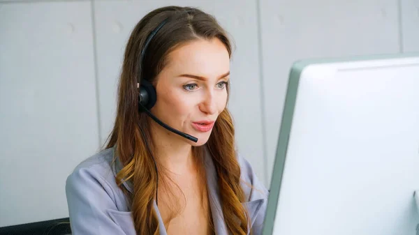 Business people wearing headset working in office — Stock Photo, Image