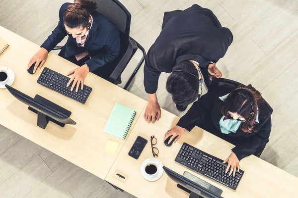 Business people wearing headset shot from top view