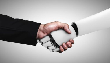 Gelecekteki teknolojiyle işbirliği yapmak için insansı robot tokalaşması
