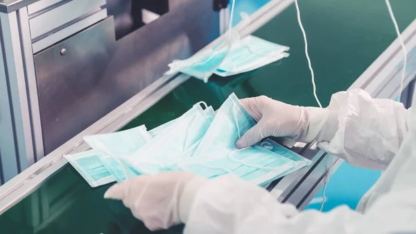 Face mask production line in modern factory