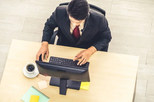 Business people wearing headset shot from top view — Stock Photo, Image