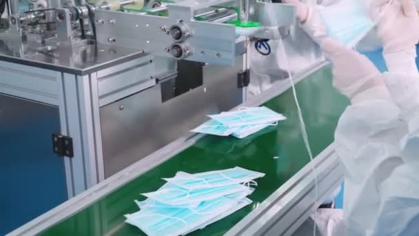 Face mask production line in modern factory — Stock Video
