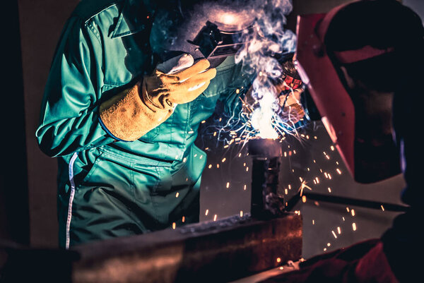 Metal welding steel works using electric arc welding machine