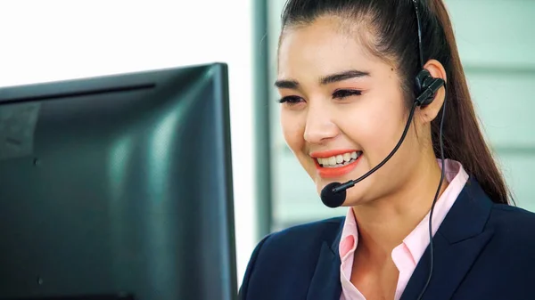 Business people wearing headset working in office — Stock Photo, Image