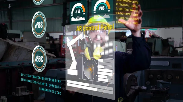 Factory worker use future holographic screen device to control manufacturing