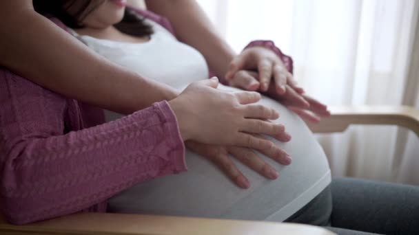 Pregnant couple feels love and relax at home. — Stock Video