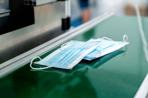 Face mask production line in modern factory