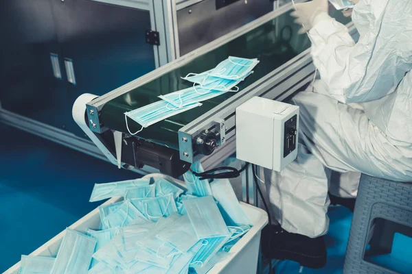 Face mask production line in modern factory