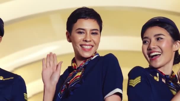 Cabin crew dancing with joy in airplane — Stock Video