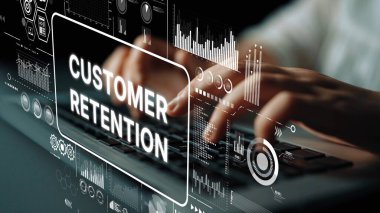 Hands typing on keyboard with digital interface focused on customer retention and data analytics in modern business environment. Asymptotic smart data analytic.