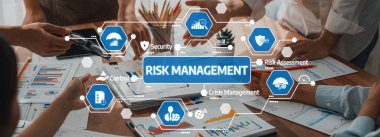 A dynamic business meeting focused on risk management, showcasing collaboration and strategic assessment for effective control and crisis handling in organizations. Amity