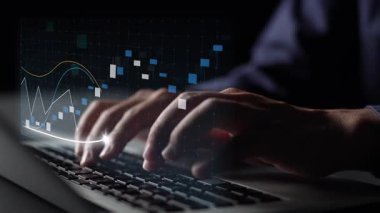 A close-up image capturing hands typing on a laptop with vibrant data charts and graphs symbolizing growth and analytics in a dark, professional environment. Copula