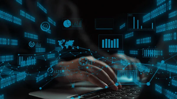 A close-up view of hands typing on a laptop, surrounded by an array of digital data visuals, including charts and graphs, symbolizing modern information technology. Xenic
