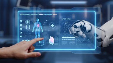 Robot ve insan eliyle insan anatomisi ikonunu işaret ediyor. Robot el ve insanın birlikte çalışırken röntgen hologramıyla bulanık labaratuvarı işaret etmesine yakın çekim. Sağlıklı..