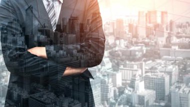 A confident businessman stands with crossed arms against an urban skyline, blending elements of technology and innovation to convey a message of progress and success. Xenic