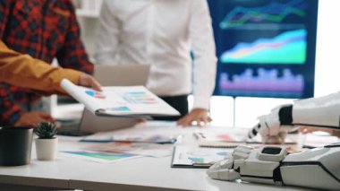 Business professionals using AI-powered tools to streamline operations, optimize analytics, and refine corporate planning. Noogenesis AI