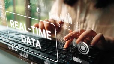 Hands Typing on Keyboard with Digital Overlays of Real-Time Data Visualization Concepts and Analytics. Asymptotic smart data analytic.