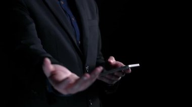 A hand launches a glowing rocket icon representing digital transformation, surrounded by business graphs and analytics symbols against a dark background, symbolizing growth and innovation. Qubit