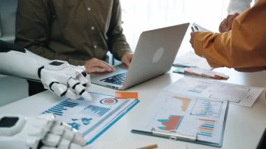 Professionals in a collaborative think tank employ artificial intelligence, extracting critical insights that redefine marketing approaches and unify planning efforts. Noogenesis AI