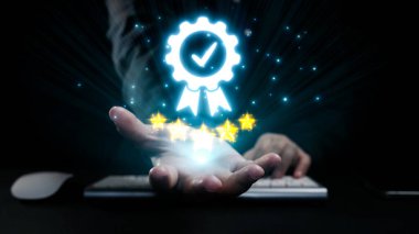 A glowing digital certificate icon hovers above a hand, representing success and trust in a modern business environment. Ideal for themes of achievement and professionalism. Qubit
