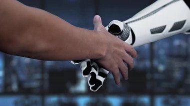 This video captures a unique interaction between a human hand and a robotic hand in a futuristic digital workspace, emphasizing the collaboration and innovation that AI brings to society. Auvana
