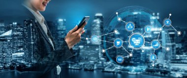 A professional woman engages with her smartphone, surrounded by a vibrant city skyline and virtual network icons that represent technology and modern business connectivity. Tessel