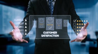 A businessman in a suit uses a virtual interface to analyze customer satisfaction and feedback ratings, highlighting the importance of user experience in the digital age. Qubit