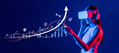 A woman in virtual reality headset engages with data visualization, showcasing growth through charts and graphs, embodying the future of strategic business analysis. XDMCP