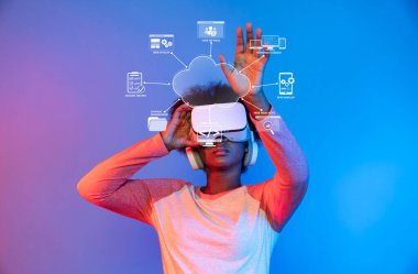 A user engages with advanced virtual reality technology, showcasing innovative cloud solutions and online capabilities in a contemporary web development setting. XDMCP