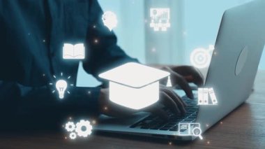 A close-up of hands working on a laptop surrounded by digital icons representing education and technology, perfect for themes of online learning and academic growth. Qubit