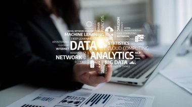 A business professional engages with a smartphone while data analytics concepts overlay a modern office setting, showcasing advanced technology and management solutions. Tessel