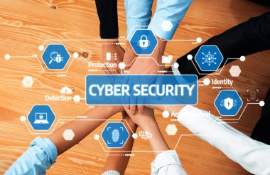 A group of diverse hands forming a circle over a wooden table, symbolizing collaboration and teamwork in the crucial field of cyber security, focusing on protection and risk management. Amity