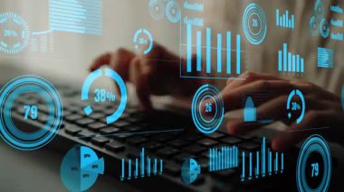 Close-up of hands typing on a keyboard with vibrant digital graphs and data visualizations overlay, representing financial statistics and business analysis scenarios. Xenic