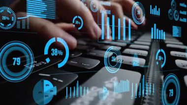 Close-up of hands typing on a keyboard with overlay of digital graphs and data analytics, showcasing a modern approach to technology and business analysis. Xenic
