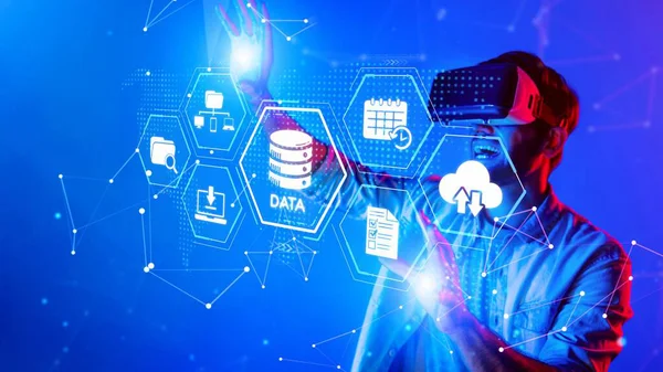 A man interacts with a vibrant virtual reality environment, showcasing data visualization and advanced technology in an immersive digital space perfect for innovation themes. Raster